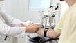 © Vladislav - The patient undergoes an electromyography (EMG) test to assess nerve activity. Detects nerve and muscle dysfunctions. Perfect for showcasing advanced medical technologies