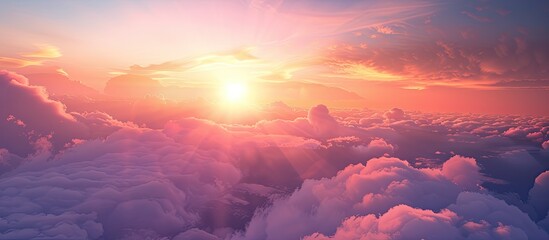 Wall Mural - Beautiful sunrise illuminating clouds in a stunning nature sky background perfect for a copy space image