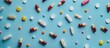 © StockKing - Various drugs like pills, tablets, and capsules arranged on a blue surface seen from above. There is room for text or other elements in the photo. image with copy space