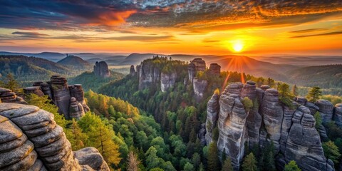 spectacular sunrise over the sandstone formations of s?chsische schweiz in gohrisch