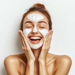 Wall Mural - White background, image of a very happy woman using a skin care product