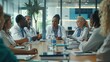 © Teerasak - A collaborative meeting scene with diverse healthcare professionals discussing equitable medical access, with a focus on preventing past failures, set in a modern conference room