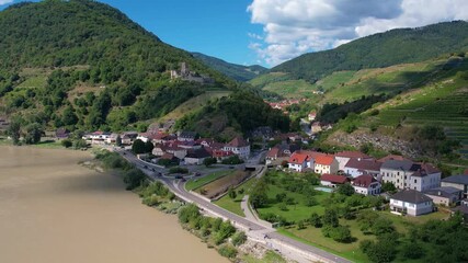 Wall Mural - Aerial Panorama of Wachau valley with Danube river near Spitz village in Lower Austria. Traditional wine and tourism region, Danube cruises.