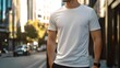 © DesignHubpro - Realistic mockup of man wearing simple white t-shirt, copy space concept for presentation advertisement, blank white t-shirt mockup business.