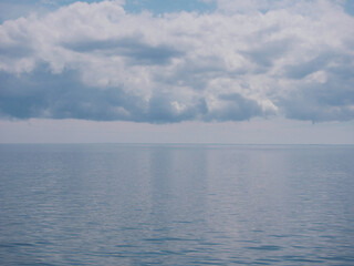 Wall Mural - Seascape under a cloudy sky. View from a cruise ship from Frederikshavn to Gothenburg