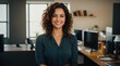 © Fred - Joyous Female Curly Locks Poses Vibrant Office Environment