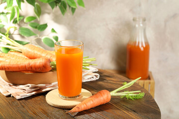 Sticker - Healthy carrot juice in glass and fresh vegetables on wooden table