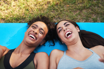 Poster - Fitness, laughing and smile with woman friends on ground in park from above for break or recovery. Exercise, face and funny with active people outdoor on grass for challenge, training or workout