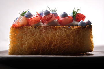 Wall Mural - Piece of cake with prawns in mojo on plate