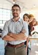 © peopleimages.com - Portrait, business and people with confidence in office for collaboration, leadership or about us of partnership. Smile, diversity and arms crossed for teamwork, career opportunity and support of Ceo
