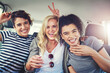 © Frank Coop/peopleimages.com - Friends, women and excited in car with peace sign on portrait for traveling, road trip and holiday. Journey, people and happy as passenger on vehicle or taxi for tour, vacation and adventure