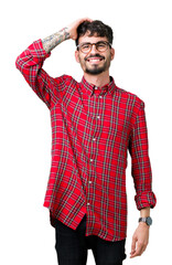 Poster - Young handsome man wearing glasses over isolated background Smiling confident touching hair with hand up gesture, posing attractive