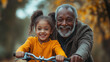 © David - An elderly man teaching his granddaughter how to ride a bike, both of them enjoying the process and the time spent together.