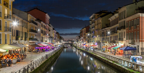 Wall Mural - MILAN, ITALY - MARCH 6, 2024: The Navigli at dusk.