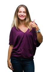 Sticker - Young beautiful blonde elegant woman over isolated background doing happy thumbs up gesture with hand. Approving expression looking at the camera with showing success.