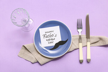 Wall Mural - Stylish table setting with greeting card on lilac background. Father day celebration concept