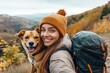 © Web - Happy Thanksgiving with Dog. Portrait of Smiling Woman Hiking with Dog on Mountain Vacation