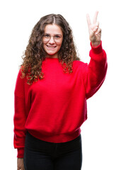 Sticker - Beautiful brunette curly hair young girl wearing glasses and winter sweater over isolated background showing and pointing up with fingers number two while smiling confident and happy.