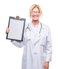 Poster - Middle age blonde doctor woman holding clipboard over isolated background with a happy face standing and smiling with a confident smile showing teeth