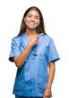 © Krakenimages.com - Young arab doctor surgeon woman over isolated background cheerful with a smile of face pointing with hand and finger up to the side with happy and natural expression on face looking at the camera.