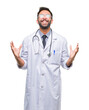 © Krakenimages.com - Adult hispanic doctor man over isolated background crazy and mad shouting and yelling with aggressive expression and arms raised. Frustration concept.