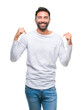 © Krakenimages.com - Adult hispanic man over isolated background looking confident with smile on face, pointing oneself with fingers proud and happy.
