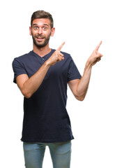 Poster - Young handsome man over isolated background smiling and looking at the camera pointing with two hands and fingers to the side.