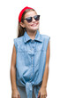 © Krakenimages.com - Young beautiful girl wearing sunglasses over isolated background with a happy and cool smile on face. Lucky person.