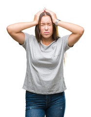 Sticker - Young caucasian beautiful woman over isolated background suffering from headache desperate and stressed because pain and migraine. Hands on head.