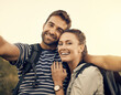 © BestCam/peopleimages.com - Couple, portrait and selfie in trip, hiking and happy in forest for adventure, smile and travel for bonding. Outdoor, backpack and profile picture for influencer, man or embrace with woman in holiday