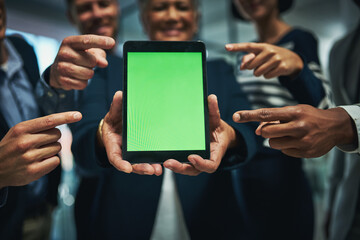 Wall Mural - Business people, tablet and green screen with hands, pointing and collaboration for app in office. Digital agency, technology and contact us in workplace for website, announcement and company info