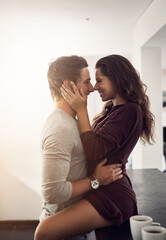 Sticker - Love, flirt and couple hug in kitchen for bonding, loving relationship and relax together in home. Dating, marriage and man and woman embrace for affection, commitment and romance for trust in house