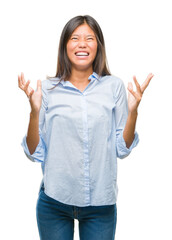 Canvas Print - Young asian business woman over isolated background crazy and mad shouting and yelling with aggressive expression and arms raised. Frustration concept.