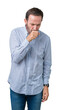 © Krakenimages.com - Handsome middle age elegant senior man over isolated background feeling unwell and coughing as symptom for cold or bronchitis. Healthcare concept.