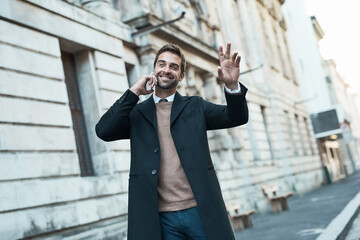 Canvas Print - Phone call, businessman and street in hailing cab, outdoor and conversation for career in United Kingdom. Male person, smile and mobile as legal expert, employee or professional at law firm in London