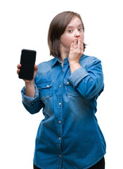 Sticker - Young adult woman with down syndrome showing smartphone screen over isolated background cover mouth with hand shocked with shame for mistake, expression of fear, scared in silence, secret concept