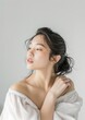 © Rawpixel.com - An Asian woman showcasing her back portrait adult skin.