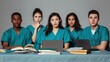 © A Denny Syahputra - A group of five diverse students focus on their studies while surrounded by books and laptops