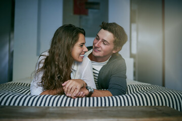 Canvas Print - Happy, couple and relax in bedroom with love or affection, conversation and commitment for relationship with trust. Man, woman and together in home with communication, security and romance bonding.