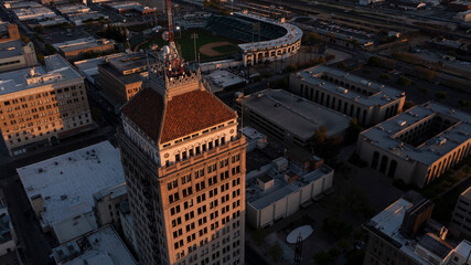 Wall Mural - Fresno, California, USA - April 18, 2023: Sunset light shines on the historic downtown Fresno skyline.