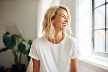 Sticker - A woman talking to someone laughing t-shirt blonde.