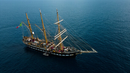 Italian navy galleon, training ship underway. Clear sea