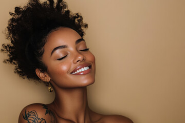 A close up of a tattooed black woman's face with her eyes closed