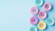 © Murda - Colorful buttons on a blue background.
