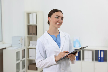 Sticker - Professional receptionist with clipboard working in hospital