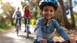 © bvbflo1 - A young boy wearing a safety helmet and riding his bike