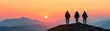 © Chanoknan - Silhouetted hikers enjoying a breathtaking sunset view atop a mountain. Adventure and nature come together in this stunning landscape.