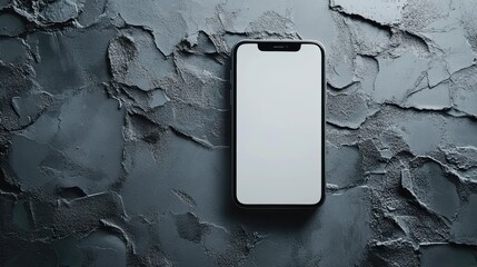 A black smartphone with a blank screen lies on a textured, dark, rough surface, perfect for showcasing mobile applications, technology themes, or background design elements,