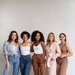 © Jean - Unity concept A diverse group of women of all skin tones, hair types posing together. A multiculture group standing together. Neutral colour. Women's day banner.