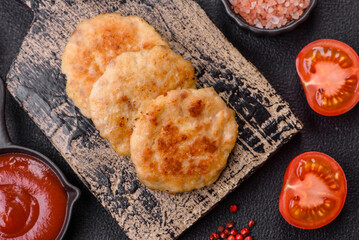 Wall Mural - Delicious fresh fried minced fish cutlets with spices and herbs